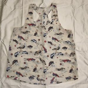 Tan women’s tank top with old car pattern. No tags